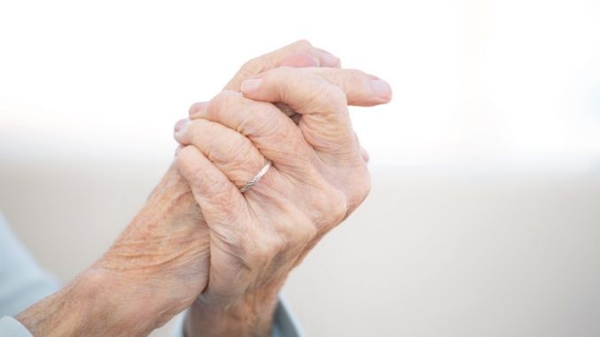 Elderly woman with arthritis