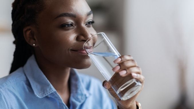woman-drinking-mineral-water