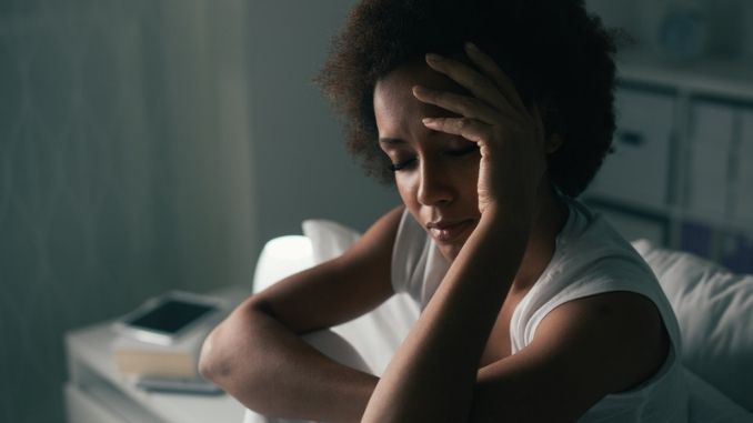 Insomnia Prevention Tips: woman-suffering-insomnia-depressed