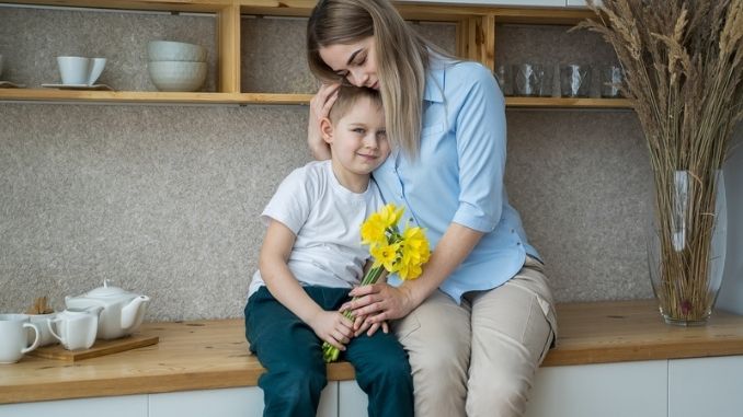 son-gives-flowers-mom