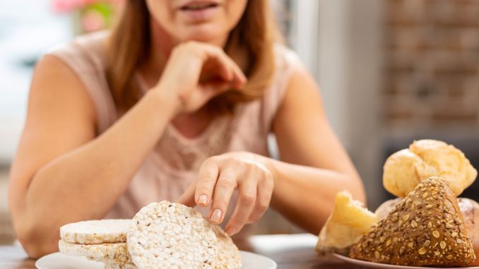 eating-gluten-free-crisps-bread