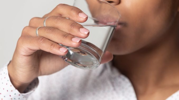 female-drinking-still-water