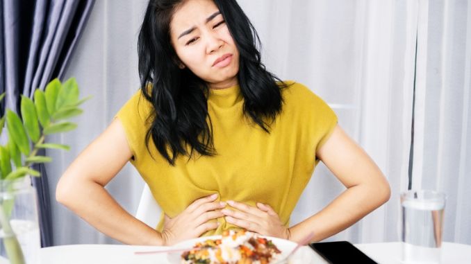 Acid Reflux Home Remedies: woman-suffering-stomachache-gerd