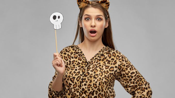 surprised-woman-halloween-costume-leopard - Halloween Celebration Worldwide